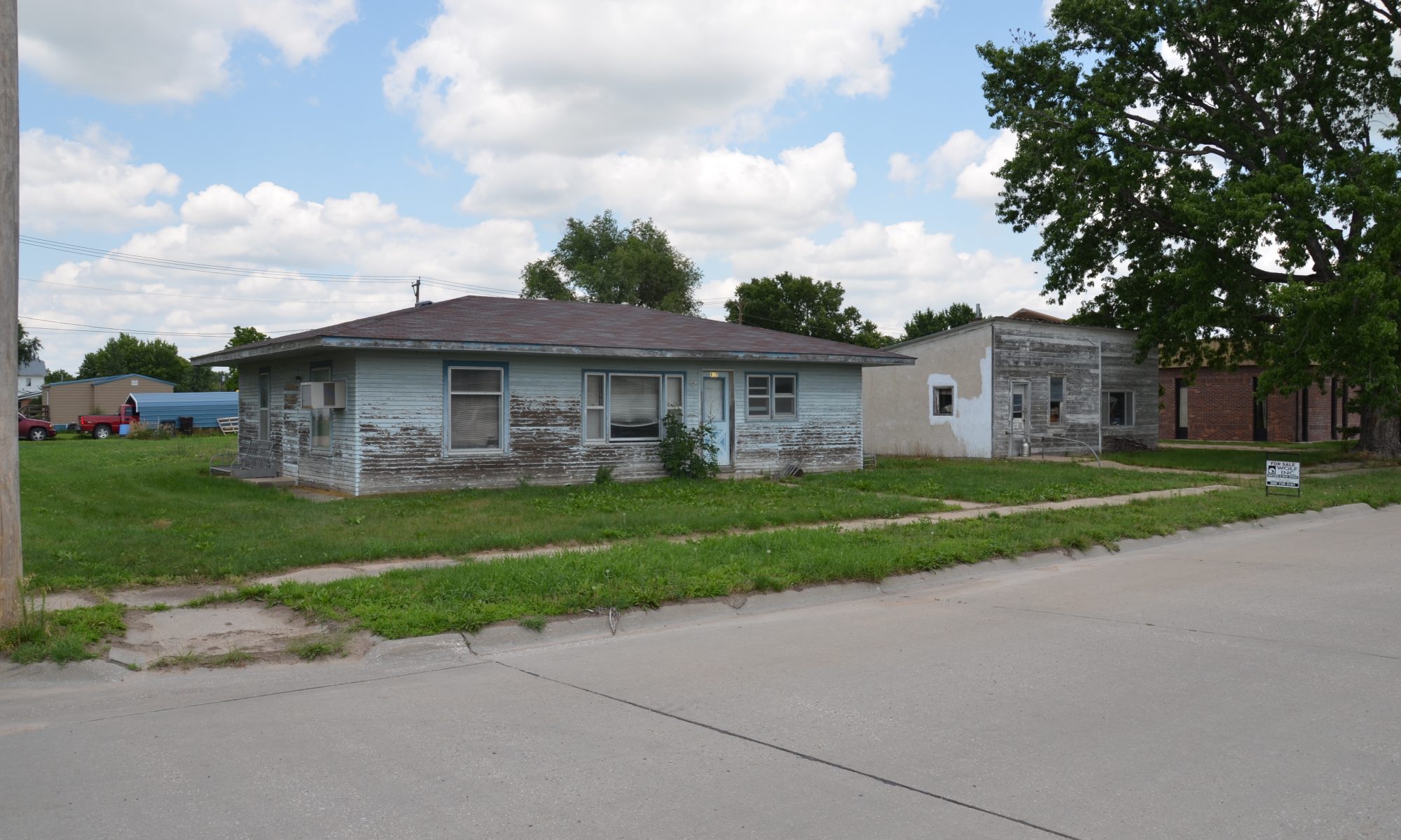 Real Estate Wolf Inc. Auction & Real Estate