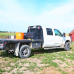 Ford F250 with flatbed trailer